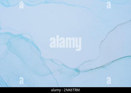 Image abstraite riche et lumineuse. Luxe abstrait fluide art peinture alcool encre. Arrière-plan bleu glace or scintillements. Banque D'Images