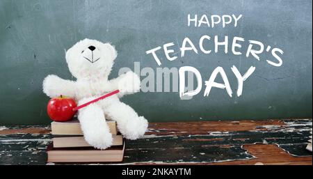 Image du texte de la journée des enseignants heureux sur l'ours et le tableau Banque D'Images