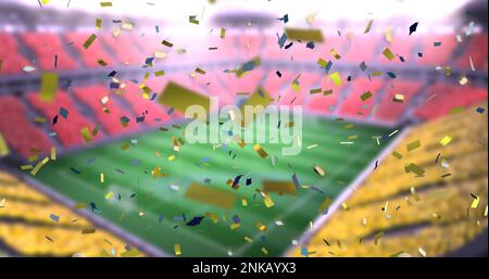 Image de confetti dorés tombant au-dessus du stade de football Banque D'Images