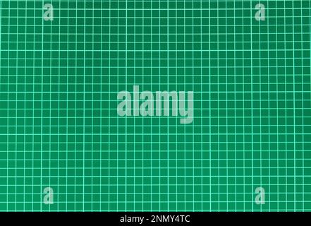 Fond vert foncé avec marquage quadrillé pour les notes. Espace pour le texte Banque D'Images