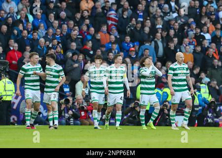 Glasgow, UK. 26th Feb, 2023. CelticÕs Japanese players Tomoki Iwata and  Yuki Kobayashi flank Kyogo Furuhashi after the The Scottish League Cup  match at Hampden Park, Glasgow. Picture credit should read: Neil