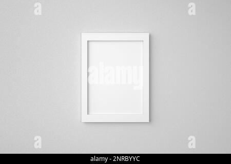 Cadre d'image rectangulaire vide ou vide minimal suspendu sur un mur blanc. Maquette d'arrière-plan 3D rendu de l'image graphique. Banque D'Images