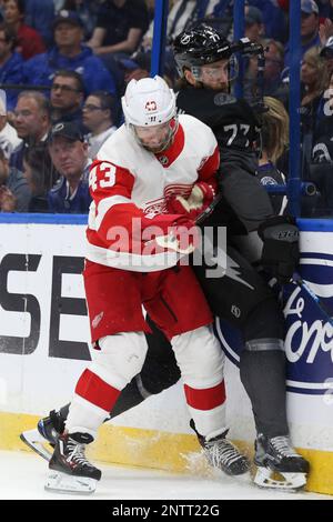 Tampa Bay Lightning defenseman Victor Hedman (77, right) celebrates with  teammates, including right wing Taylor Raddysh (16) and left wing Ross  Colton (79) after scoring against the New Jersey Devils during the