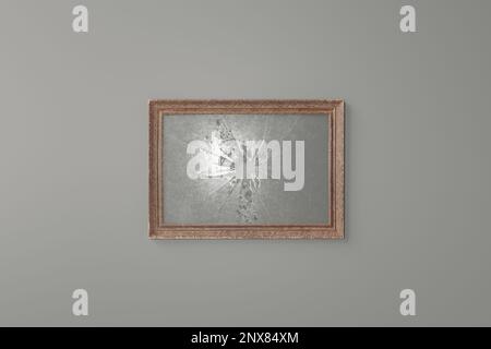 3d rendu d'un cadre photo vintage avec plaque de verre cassée devant un arrière-plan gris Banque D'Images