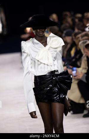 A model wears a creation as part of the Chanel Fall/Winter 2023-2024  ready-to-wear collection presented Tuesday, March 7, 2023 in Paris.  (Vianney Le Caer/Invision/AP Stock Photo - Alamy