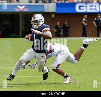 Virginia wide receiver Olamide Zaccheaus (4) runs against Duke during the  second half of an NCAA college football game in Durham, N.C., Saturday,  Oct. 20, 2018. Virginia won 28-14. (AP Photo/Gerry Broome