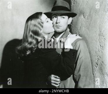 L'actrice américaine Veronica Lake et l'acteur Alan Ladd dans le film This Gun for Hire, USA 1942 Banque D'Images