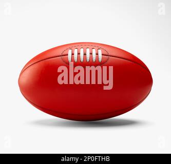 Un ballon de football australien générique sans marque sur un fond de studio isolé - rendu 3D Banque D'Images