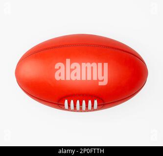 Un ballon de football australien générique sans marque sur un fond de studio isolé - rendu 3D Banque D'Images