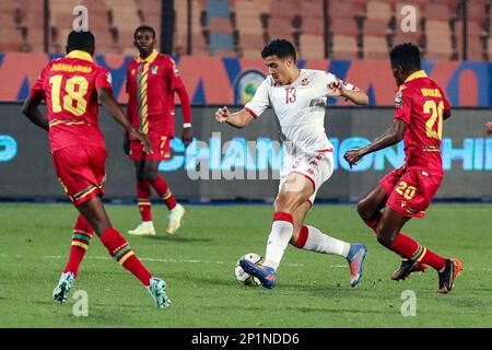 Le Caire, Égypte. 3rd mars 2023. Mohamed Derbali (2nd R) de Tunisie participe au quart de finale du match de football entre le Congo et la Tunisie à la CAF (Confédération africaine de football) U-20 coupe des nations de l'Afrique 2023 au Caire, en Égypte, au 3 mars 2023. Credit: Ahmed Gomaa/Xinhua/Alamy Live News Banque D'Images