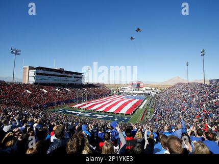2015 December 19: Fans watch two F-15 fighters perform a fly over the field before the start of the game between the BYU Cougars and the Utah Utes at the Royal Purple Las Vegas Bowl in Las Vegas, Nevada. The Utah Utes would defeat the BYU Cougars 35-28. (Photo by Marc Sanchez/Icon Sportswire) (Icon Sportswire via AP Images)