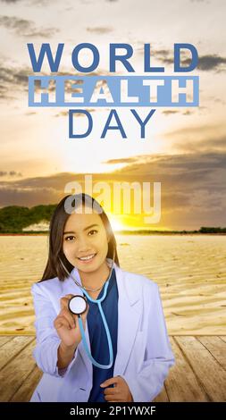 Femme asiatique médecin montrant un stéthoscope. Concept de la Journée mondiale de la santé Banque D'Images