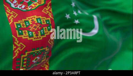 Détail du drapeau national du Turkménistan. Champ vert, bande verticale rouge, croissant de lune, cinq étoiles, motifs de tapis. 3d rendu d'illustration. Sél Banque D'Images