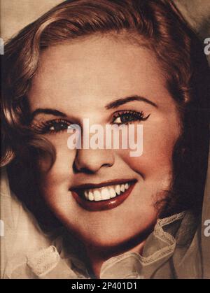 1940 environ : La chanteuse et actrice canadienne DEANNA DURBIN ( née à Winnipeg , Manitoba , Canada, le 4 décembre 1921 ) - CINÉMA - portrait - ritrato - portrait - sourire - sorriso - cantte - musical --- Archivio GBB Banque D'Images