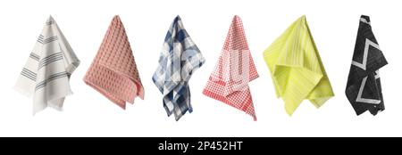 Ensemble avec différentes serviettes de cuisine propres sur fond blanc. Bannière Banque D'Images