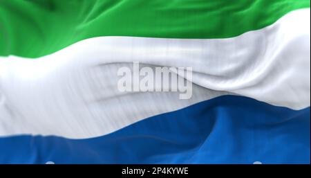 Détail du drapeau national Sierra-léonais qui agite dans le vent. Tricolore avec bandes horizontales en vert, blanc et bleu. Arrière-plan texturé en tissu. Se Banque D'Images