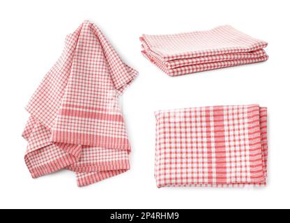 Ensemble avec des serviettes de cuisine propres sur fond blanc Banque D'Images