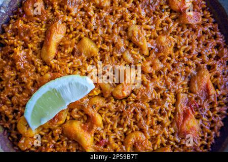 La Paella. Dans la Pepica,restaurant,6 Passeig Neptú.La plage de La Malvarrosa Valencia, Espagne. Banque D'Images