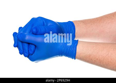 Crop anonyme homme médecin dans des gants en latex bleu tenant les mains contre fond blanc Banque D'Images