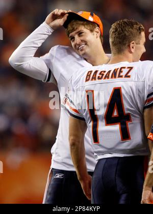 Denver Broncos quarterbacks (L-R) Preston Parsons of Northern Arizona, Jay  Cutler of Vanderbilt, starter Jake Plummer, and backup Bradlee Van Pelt  practice together during first practice session at Broncos training camp in