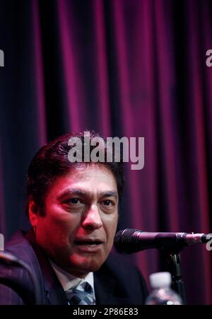 Jorge Hernandez, of the band Los Tigres Del Norte, speaks during a news conference in Los Angeles, Wednesday, Aug. 12, 2009. (AP Photo/Matt Sayles)