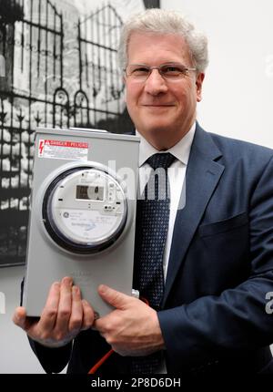 William Gausman, Pepco Holding, Inc., Senior Vice President of Asset Management and Planning, holds an electric meter with smart technology during a display of smart grid technology on Capitol Hill in Washington, Monday, April 20, 2009. The 'smart grid' has become the buzz of the electric power industry, at the White House and among members of Congress. (AP Photo/Susan Walsh)