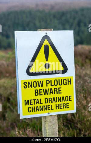 Panneau d'avertissement Snow Plough Beware dans un parc éolien aux frontières écossaises Banque D'Images