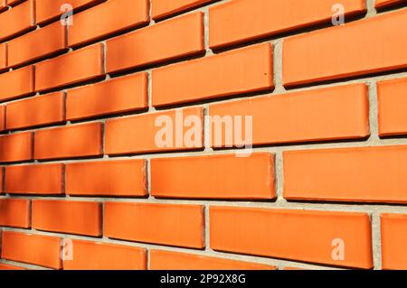 Un fragment de maçonnerie décorative d'un mur de briques Banque D'Images