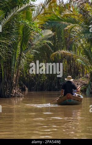 Bateaux dans le delta du Mékong au vietnam. Banque D'Images