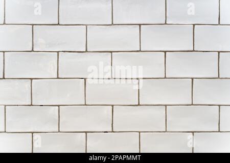 Arrière-plan carreaux de céramique blancs. Carrelage blanc vintage pour le design intérieur de la salle de bain ou de la cuisine. Photo de haute qualité Banque D'Images
