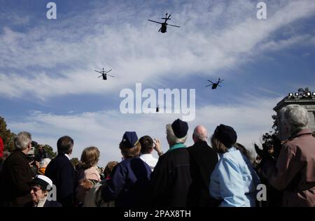 Four Black Hawk helicopters perform a flyover the Women's War Memorial in Arlington, Va., Saturday, Nov. 3, 2007. The Women's War Memorial celebrate it's 10th anniversary. (AP Photo/Lawrence Jackson)