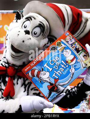 The Cat In The Hat mascot holds the 'I Can Do That!' game at the Toy Wishes Holiday Preview on Tuesday, Oct. 2, 2007 in New York. The $19.99 game features Dr. Seuss's favorite rainy day visitor. (AP Photo/Mark Lennihan)