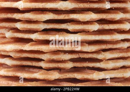 vue rapprochée des gaufres empilées, résumé des petits gâteaux croquants en plein format, texture d'arrière-plan des plats sucrés et délicieux Banque D'Images