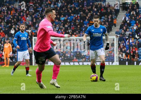 Glasgow, Royaume-Uni. 12th mars 2023. ROYAUME-UNI. Les Rangers ont joué à Raith Rovers dans les quarts de finale de la coupe écossaise 2022 -2023, à Ibrox Park, à Glasgow, le stade de base du Rangers FC. Les Rangers ont gagné 3 - 0 avec des buts de Connor Goldson (numéro 6) en 42 minutes et Scott Arfield (numéro 37) en 87 minutes. Il y avait aussi un but propre par Ryan Nolan (numéro 5) dans les 58 minutes après une erreur défensive. Crédit : Findlay/Alay Live News Banque D'Images