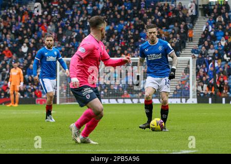 Glasgow, Royaume-Uni. 12th mars 2023. ROYAUME-UNI. Les Rangers ont joué à Raith Rovers dans les quarts de finale de la coupe écossaise 2022 -2023, à Ibrox Park, à Glasgow, le stade de base du Rangers FC. Les Rangers ont gagné 3 - 0 avec des buts de Connor Goldson (numéro 6) en 42 minutes et Scott Arfield (numéro 37) en 87 minutes. Il y avait aussi un but propre par Ryan Nolan (numéro 5) dans les 58 minutes après une erreur défensive. Crédit : Findlay/Alay Live News Banque D'Images