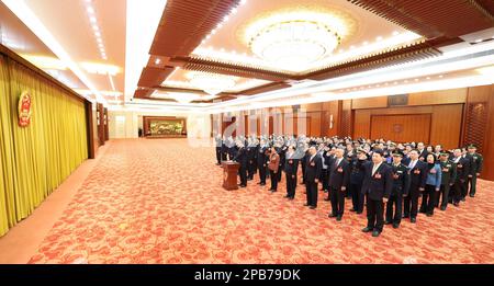 Pékin, Chine. 12th mars 2023. Les membres des comités spéciaux du Congrès national du peuple (CNP) de 14th s'engagent à faire allégeance à la Constitution de Beijing, capitale de la Chine, 12 mars 2023. Credit: Pang Xinglei/Xinhua/Alay Live News Banque D'Images