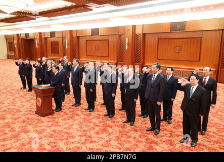 Pékin, Chine. 12th mars 2023. Les ministres du Conseil d'Etat, les chefs de commissions, le gouverneur de la banque centrale et le vérificateur général s'engagent à faire allégeance à la Constitution de Pékin, capitale de la Chine, 12 mars 2023. Credit: Pang Xinglei/Xinhua/Alay Live News Banque D'Images