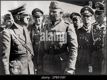 POLOGNE OCCUPATION NAZIE Adolf Hitler en conversation avec des officiers, y compris avec le général Walter von Reichenau (au centre) et le général Erwin Rommel (2nd de droite). Personnes représentées Erwin Rommel, Walter von Reichenau, Adolf Hitler Date 13 septembre 1939 Banque D'Images