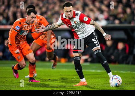 Rotterdam - Daryl van MIEGHEM du FC Volendam, Quilindschy Hartman de Feyenoord pendant le match entre Feyenoord et le FC Volendam au Stadion Feijenoord de Kuip le 12 mars 2023 à Rotterdam, pays-Bas. (Box to Box Pictures/Tom Bode) Banque D'Images