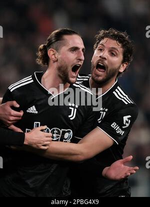 Turin, Italie. 12th mars 2023. Adrien Rabiot (L) du FC Juventus célèbre son but lors d'un match de football de série A entre le FC Juventus et la Sampdoria à Turin, en Italie, sur 12 mars 2023. Credit: Federico Tardito/Xinhua/Alamy Live News Banque D'Images