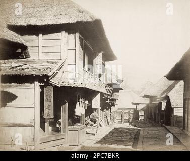 Felix (Felice) Beato studio 19th c. photo d'époque Japon: scène de rue, magasins Banque D'Images