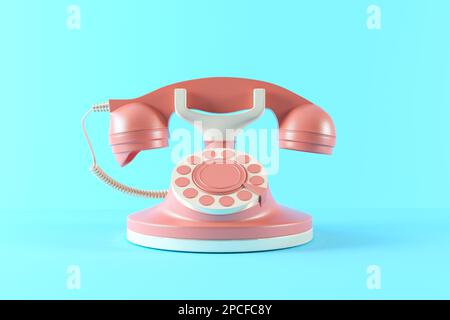 Téléphone avec bague rétro, téléphone filaire vintage en plastique avec combiné. Isolé sur fond bleu. Téléphone filaire vintage dans des couleurs tendance. Banque D'Images