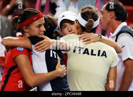 Justine Henin-Hardenne of Belgium(L) defeated Maria Sharpova of Russia(R)  7-5, 6-2 in the finals of the Dubai Tennis Championships in Dubai, United  Arab Emirates on February 25, 2006. Justine won US$ 159,000.00