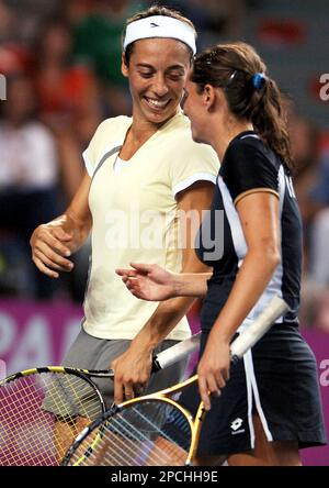 Justine Henin-Hardenne of Belgium(L) defeated Maria Sharpova of Russia(R)  7-5, 6-2 in the finals of the Dubai Tennis Championships in Dubai, United  Arab Emirates on February 25, 2006. Justine won US$ 159,000.00