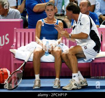 Justine Henin-Hardenne of Belgium(L) defeated Maria Sharpova of Russia(R)  7-5, 6-2 in the finals of the Dubai Tennis Championships in Dubai, United  Arab Emirates on February 25, 2006. Justine won US$ 159,000.00