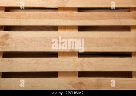 Palette en bois comme arrière-plan, vue de dessus. Transport et stockage Banque D'Images