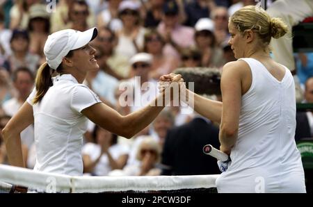 Justine Henin-Hardenne of Belgium(L) defeated Maria Sharpova of Russia(R)  7-5, 6-2 in the finals of the Dubai Tennis Championships in Dubai, United  Arab Emirates on February 25, 2006. Justine won US$ 159,000.00