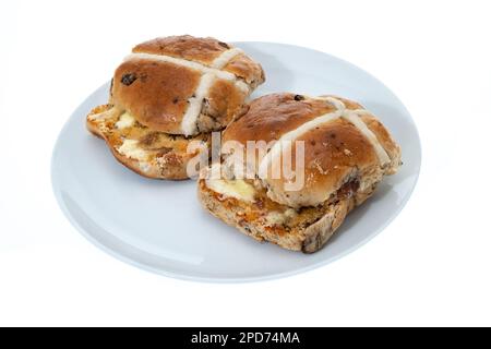 Crossettes chaudes fraîchement cuites et grillées au beurre - fond blanc Banque D'Images