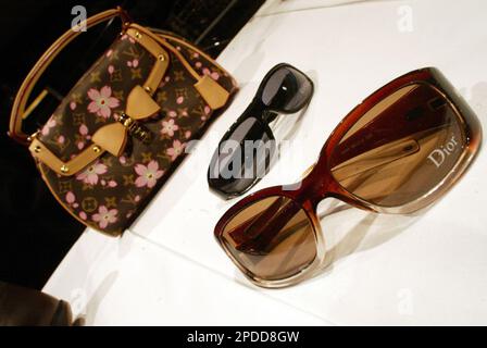 A counterfeit Louis Vuitton purse in the Fake or Real display, The Mob  Museum, Las Vegas (City of Las Vegas), Nevada, United States Stock Photo -  Alamy