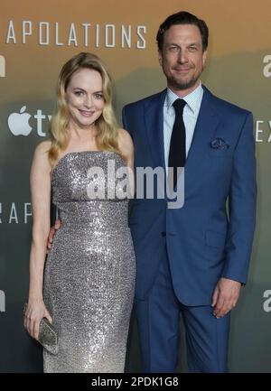 Heather Graham, left, and John de Neufville arrive at the Los Angeles